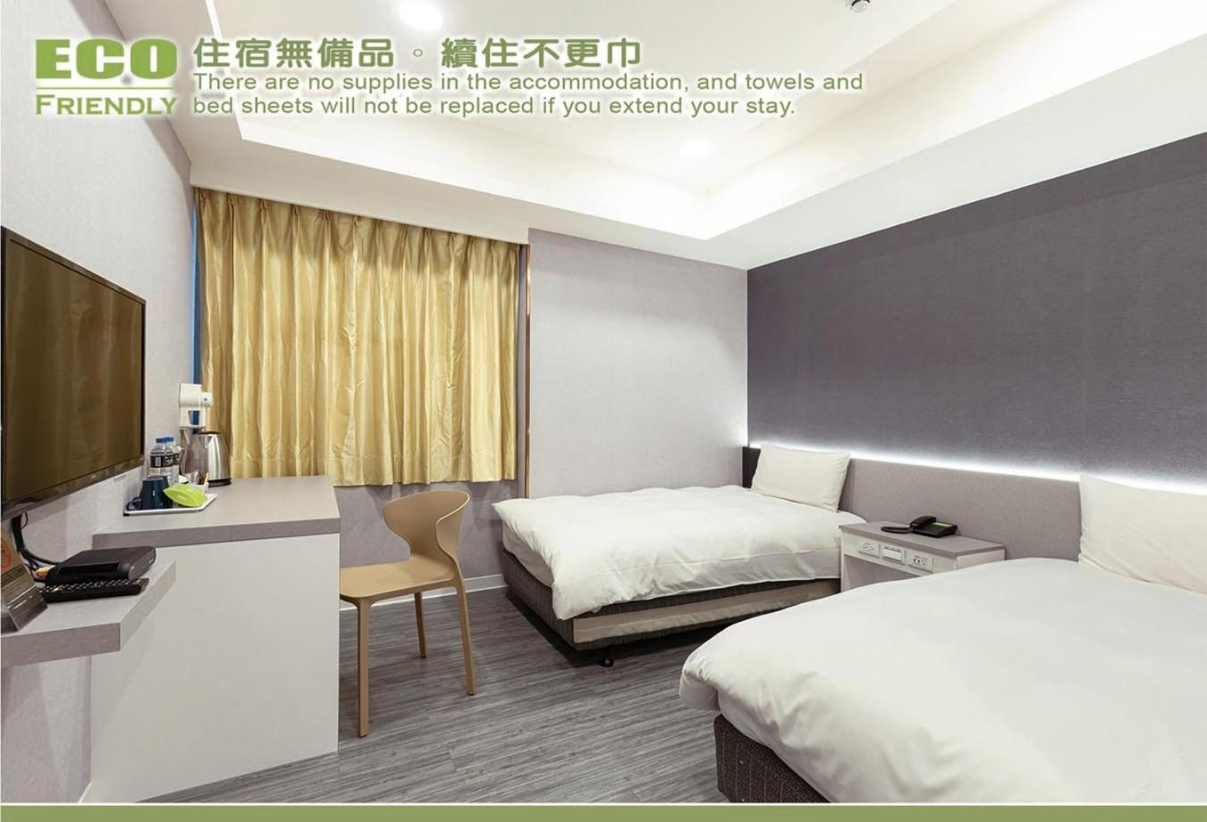 Kiwi Express Hotel - Zhongqing Taichung Rum bild