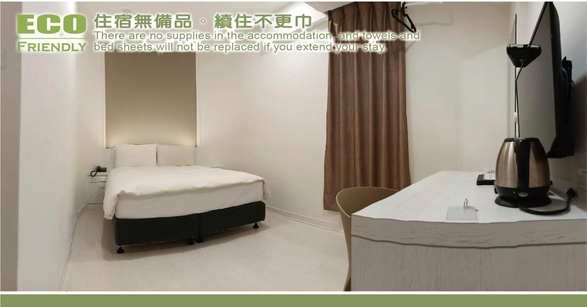 Kiwi Express Hotel - Zhongqing Taichung Rum bild