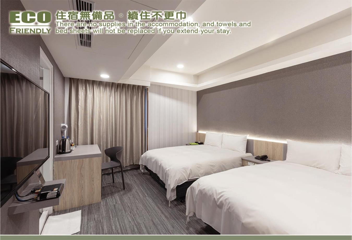 Kiwi Express Hotel - Zhongqing Taichung Rum bild